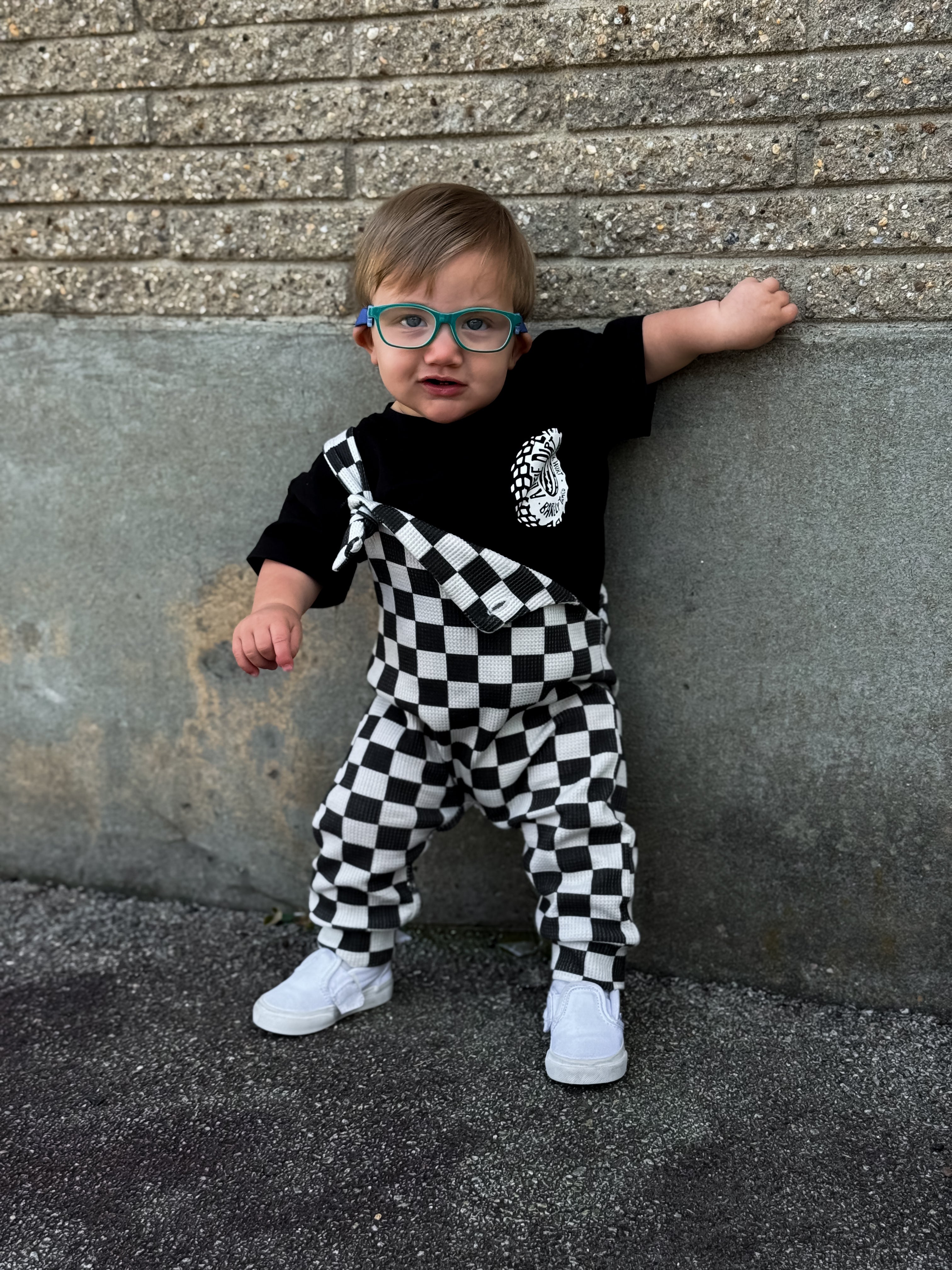 black infant checkered overalls