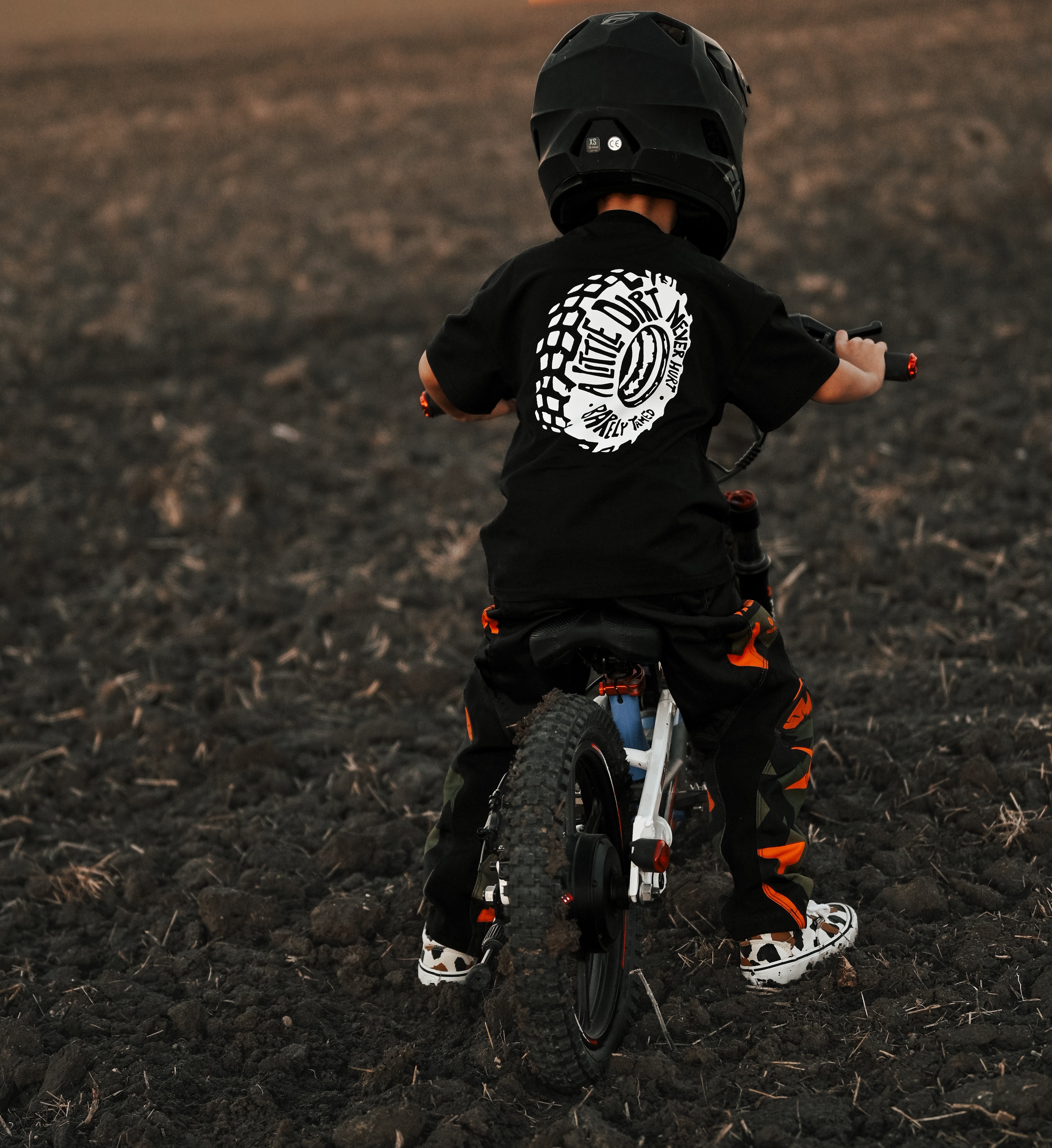 A Little Dirt Never Hurt Toddler Graphic T-Shirt – Black | Monster Truck Dirt Bike Tee - Barely Tamed