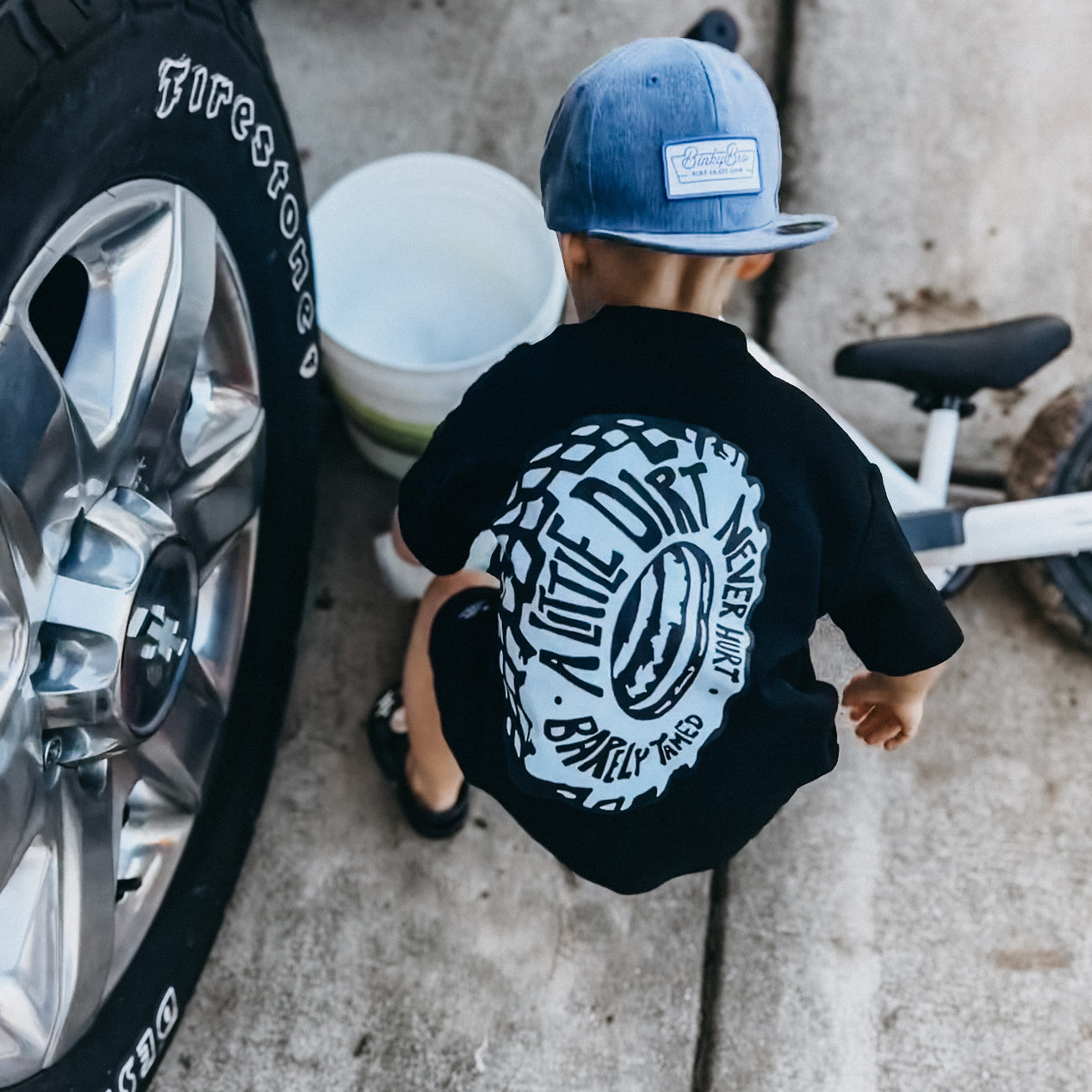 A Little Dirt Never Hurt Toddler Graphic T-Shirt – Black | Monster Truck Dirt Bike Tee