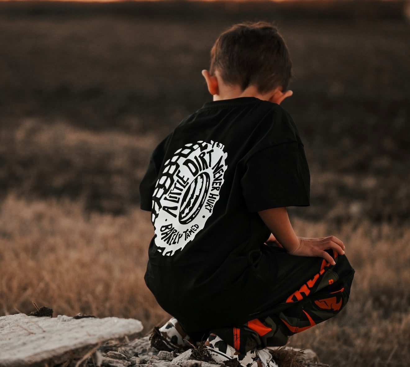 A Little Dirt Never Hurt Toddler Graphic T-Shirt – Black | Monster Truck Dirt Bike Tee - Barely Tamed