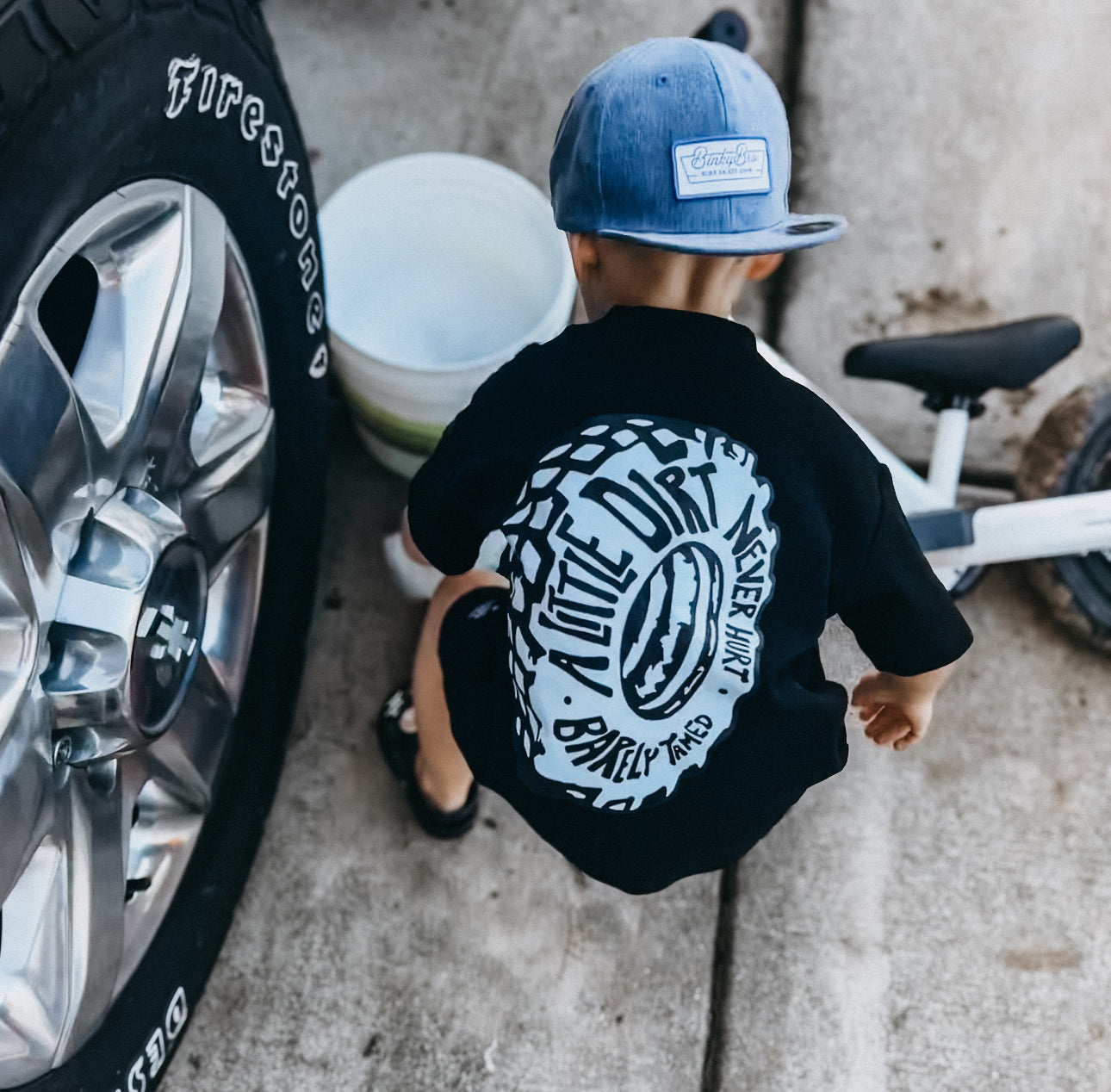 A Little Dirt Never Hurt Toddler Graphic T-Shirt – Black | Monster Truck Dirt Bike Tee