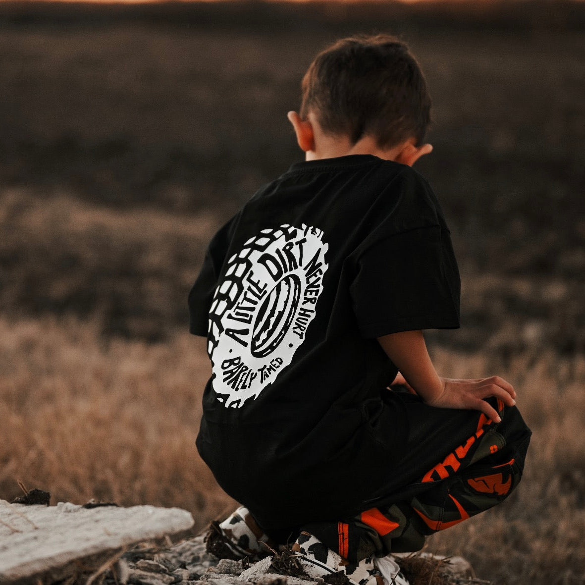 A Little Dirt Never Hurt Toddler Graphic T-Shirt – Black | Monster Truck Dirt Bike Tee - Barely Tamed